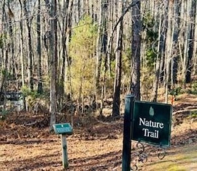 Come build your dream home on this beautiful, wooded, corner lot on The Golf Club At Cedar Creek in South Carolina - for sale on GolfHomes.com, golf home, golf lot