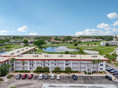 This updated, fully furnished 2nd-floor unit overlooks the 2nd on Seven Lakes Golf and Tennis Community in Florida - for sale on GolfHomes.com, golf home, golf lot