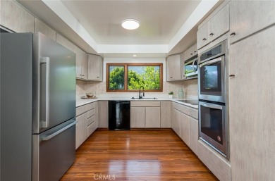 Welcome to this charming 3-bedroom, 2-bathroom hillside retreat on Chevy Chase Country Club in California - for sale on GolfHomes.com, golf home, golf lot