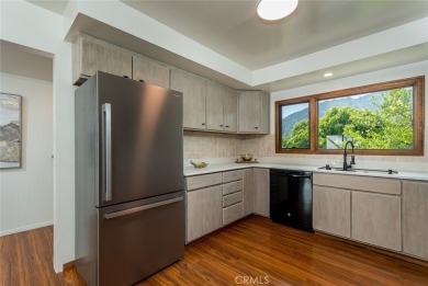 Welcome to this charming 3-bedroom, 2-bathroom hillside retreat on Chevy Chase Country Club in California - for sale on GolfHomes.com, golf home, golf lot