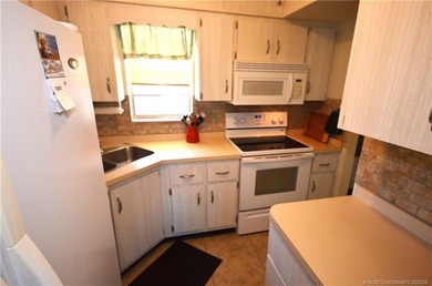 Wow! Act fast! FURNISHED, 2/2, corner unit, light & bright & on  in Florida - for sale on GolfHomes.com, golf home, golf lot