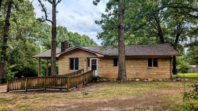 This updated home sits only a few blocks from Crown Lake Pier on The Course At Turkey Mountain in Arkansas - for sale on GolfHomes.com, golf home, golf lot