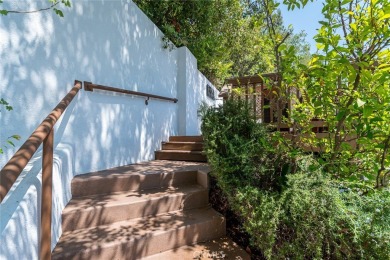 Welcome to this charming 3-bedroom, 2-bathroom hillside retreat on Chevy Chase Country Club in California - for sale on GolfHomes.com, golf home, golf lot