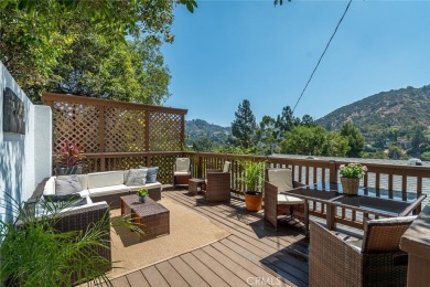 Welcome to this charming 3-bedroom, 2-bathroom hillside retreat on Chevy Chase Country Club in California - for sale on GolfHomes.com, golf home, golf lot