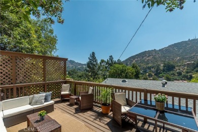 Welcome to this charming 3-bedroom, 2-bathroom hillside retreat on Chevy Chase Country Club in California - for sale on GolfHomes.com, golf home, golf lot