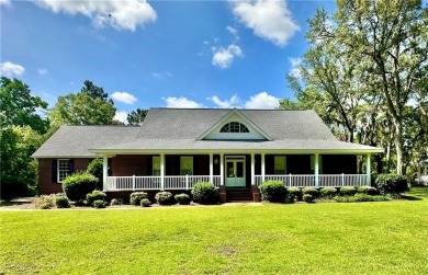 Imagine mornings on your spacious covered front porch or on Okefenokee Country Club in Georgia - for sale on GolfHomes.com, golf home, golf lot