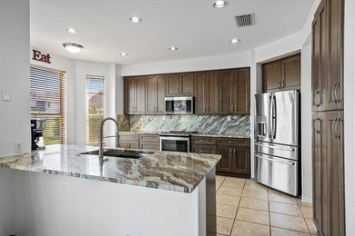 This impeccably Willow model offers 4 bedrooms plus a loft and 3 on Winston Trails Golf Course in Florida - for sale on GolfHomes.com, golf home, golf lot