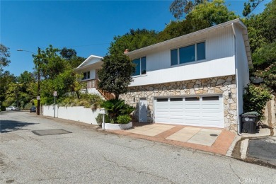 Welcome to this charming 3-bedroom, 2-bathroom hillside retreat on Chevy Chase Country Club in California - for sale on GolfHomes.com, golf home, golf lot