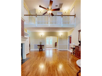 Imagine mornings on your spacious covered front porch or on Okefenokee Country Club in Georgia - for sale on GolfHomes.com, golf home, golf lot