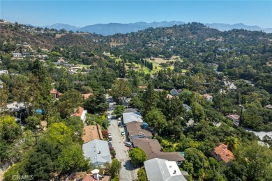 Welcome to this charming 3-bedroom, 2-bathroom hillside retreat on Chevy Chase Country Club in California - for sale on GolfHomes.com, golf home, golf lot