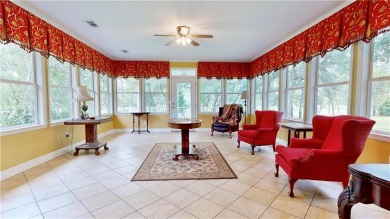 Imagine mornings on your spacious covered front porch or on Okefenokee Country Club in Georgia - for sale on GolfHomes.com, golf home, golf lot