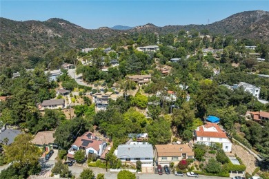 Welcome to this charming 3-bedroom, 2-bathroom hillside retreat on Chevy Chase Country Club in California - for sale on GolfHomes.com, golf home, golf lot