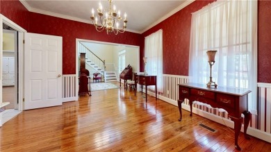 Imagine mornings on your spacious covered front porch or on Okefenokee Country Club in Georgia - for sale on GolfHomes.com, golf home, golf lot