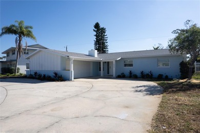 Situated in St Petersburg's highly sought after community on Pasadena Yacht and Country Club in Florida - for sale on GolfHomes.com, golf home, golf lot