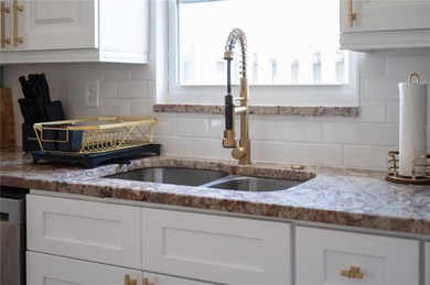 Situated in St Petersburg's highly sought after community on Pasadena Yacht and Country Club in Florida - for sale on GolfHomes.com, golf home, golf lot