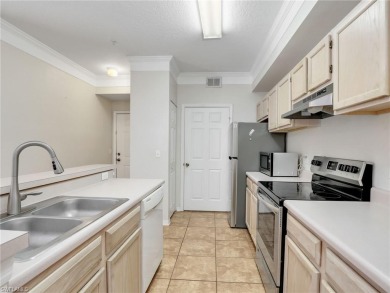 Discover pride of ownership in this pristine 2-bedroom, 2-bath on Gateway Golf and Country Club in Florida - for sale on GolfHomes.com, golf home, golf lot