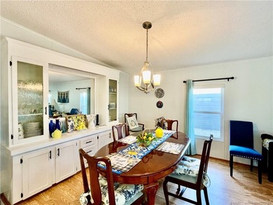 Delightful, remodeled home on a corner lot! Complete storm on Indianwood Golf and Country Club in Florida - for sale on GolfHomes.com, golf home, golf lot