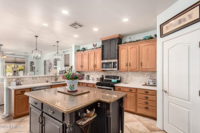 Discover this stunning single-story home in the coveted Johnson on The Golf Club At Johnson Ranch in Arizona - for sale on GolfHomes.com, golf home, golf lot