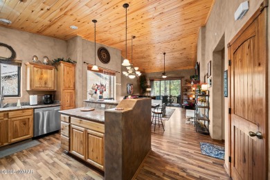 Just Pack Your Clothes and Head to Your Mountain Getaway on Silver Creek Golf Club in Arizona - for sale on GolfHomes.com, golf home, golf lot