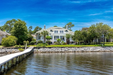 Timeless elegance on the bay behind the gates of prestigious on Regatta Bay Golf and Country Club in Florida - for sale on GolfHomes.com, golf home, golf lot