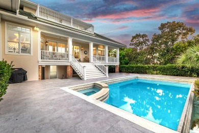 Timeless elegance on the bay behind the gates of prestigious on Regatta Bay Golf and Country Club in Florida - for sale on GolfHomes.com, golf home, golf lot