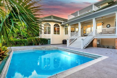 Timeless elegance on the bay behind the gates of prestigious on Regatta Bay Golf and Country Club in Florida - for sale on GolfHomes.com, golf home, golf lot