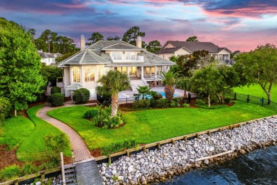 Timeless elegance on the bay behind the gates of prestigious on Regatta Bay Golf and Country Club in Florida - for sale on GolfHomes.com, golf home, golf lot