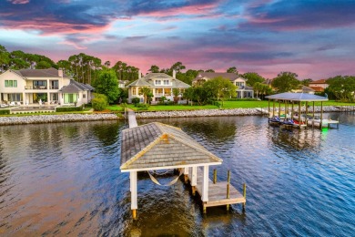 Timeless elegance on the bay behind the gates of prestigious on Regatta Bay Golf and Country Club in Florida - for sale on GolfHomes.com, golf home, golf lot