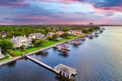 Timeless elegance on the bay behind the gates of prestigious on Regatta Bay Golf and Country Club in Florida - for sale on GolfHomes.com, golf home, golf lot