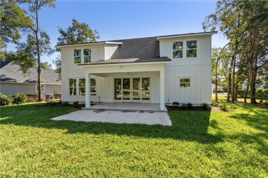This stunning two-story home by renowned local builder Josselyn on Laurel Island Links in Georgia - for sale on GolfHomes.com, golf home, golf lot