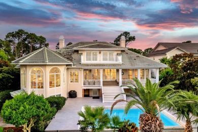 Timeless elegance on the bay behind the gates of prestigious on Regatta Bay Golf and Country Club in Florida - for sale on GolfHomes.com, golf home, golf lot