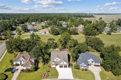 This stunning two-story home by renowned local builder Josselyn on Laurel Island Links in Georgia - for sale on GolfHomes.com, golf home, golf lot