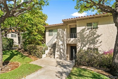 Wonderful opportunity to own this ground-level condo overlooking on El Niguel Country Club in California - for sale on GolfHomes.com, golf home, golf lot