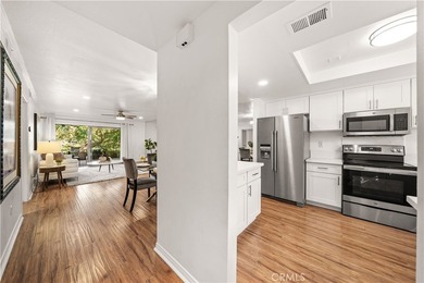 Wonderful opportunity to own this ground-level condo overlooking on El Niguel Country Club in California - for sale on GolfHomes.com, golf home, golf lot