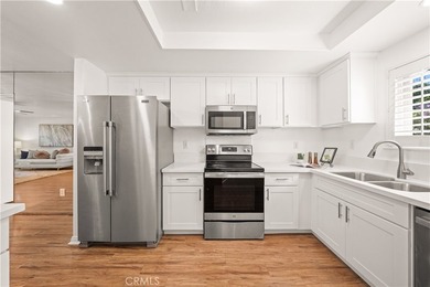 Wonderful opportunity to own this ground-level condo overlooking on El Niguel Country Club in California - for sale on GolfHomes.com, golf home, golf lot