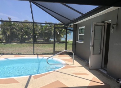 Pool home on Oakland Hills golf course in the sought after on Rotonda Golf and Country Club The Hills Course in Florida - for sale on GolfHomes.com, golf home, golf lot