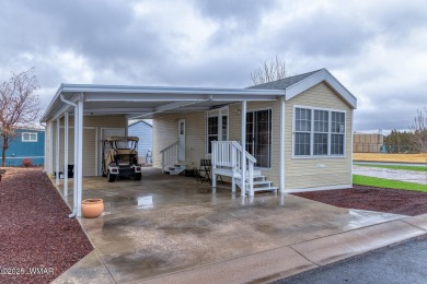 This well-kept park model boasts vaulted ceilings and natural on Juniper Ridge R.V. Golf Resort in Arizona - for sale on GolfHomes.com, golf home, golf lot