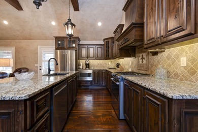 Stunning 4-bedroom, 21/2-bath French Country home in the on Rivercut Golf Course in Missouri - for sale on GolfHomes.com, golf home, golf lot