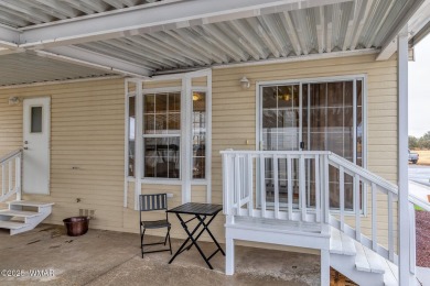 This well-kept park model boasts vaulted ceilings and natural on Juniper Ridge R.V. Golf Resort in Arizona - for sale on GolfHomes.com, golf home, golf lot