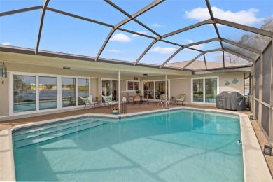 HARBOR ISLE HAS NEVER HAD ANY FLOODING ISSUES ~ LAKEFRONT POOL on Mangrove Bay Golf Course in Florida - for sale on GolfHomes.com, golf home, golf lot