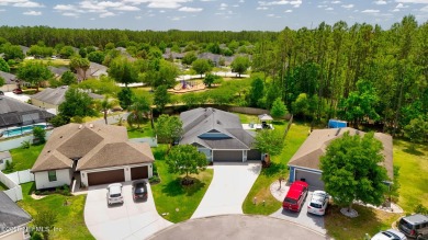 Welcome to your dream home on a huge cul-de-sac lot with on St. Johns Golf and Country Club in Florida - for sale on GolfHomes.com, golf home, golf lot