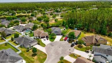Welcome to your dream home on a huge cul-de-sac lot with on St. Johns Golf and Country Club in Florida - for sale on GolfHomes.com, golf home, golf lot