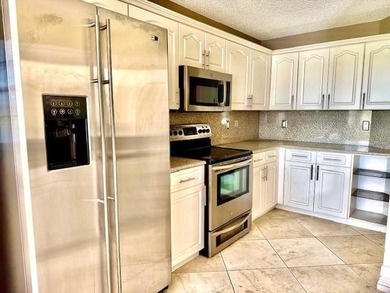 Welcome to this beautifully located two-story townhouse in the on Grand Palms Hotel and Golf Resort in Florida - for sale on GolfHomes.com, golf home, golf lot