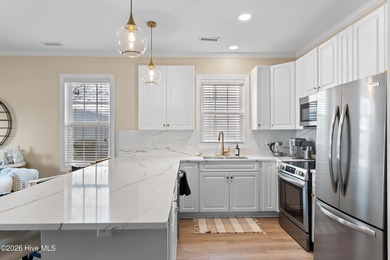 Wake up to panoramic views of St. James Marina from this on Members Club At St. James Plantation in North Carolina - for sale on GolfHomes.com, golf home, golf lot