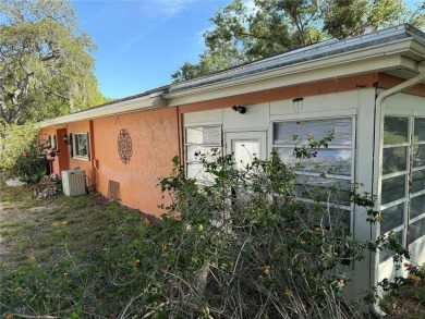 This 3-bedroom, 2-bathroom, 2-car garage home in Beacon Woods is on Beacon Woods Golf Club in Florida - for sale on GolfHomes.com, golf home, golf lot