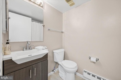 Welcome home to this bright and spacious 3-bedroom, 2-bath patio on Leisure World Golf Club in Maryland - for sale on GolfHomes.com, golf home, golf lot