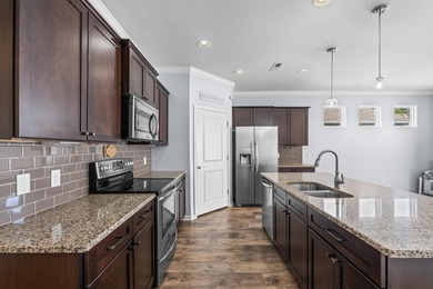 Located in the gated community of Waters Edge, this 3-bedroom on Tidewater Golf Club and Plantation in South Carolina - for sale on GolfHomes.com, golf home, golf lot