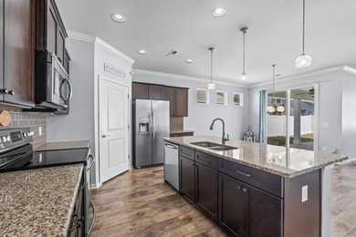 Located in the gated community of Waters Edge, this 3-bedroom on Tidewater Golf Club and Plantation in South Carolina - for sale on GolfHomes.com, golf home, golf lot