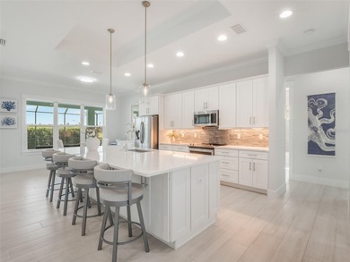 Prefer to have your toes in the sand instead of in the snow this on Venetian Bay Golf Course in Florida - for sale on GolfHomes.com, golf home, golf lot