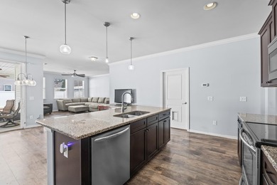 Located in the gated community of Waters Edge, this 3-bedroom on Tidewater Golf Club and Plantation in South Carolina - for sale on GolfHomes.com, golf home, golf lot